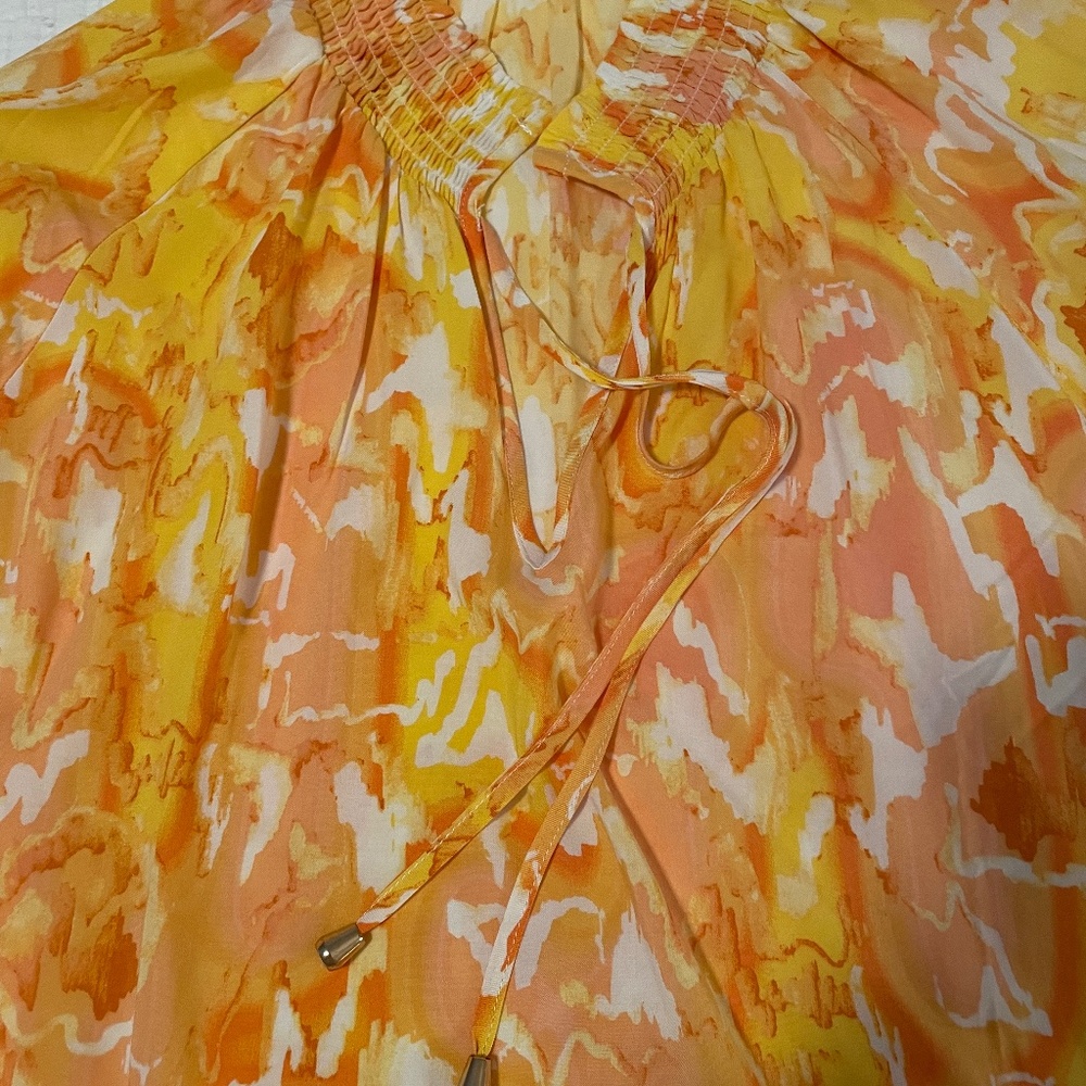 Flowy  3/4  sleeves top by Tart. Never worn.
